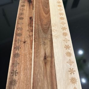 Wooden snowflake holiday charcuterie board